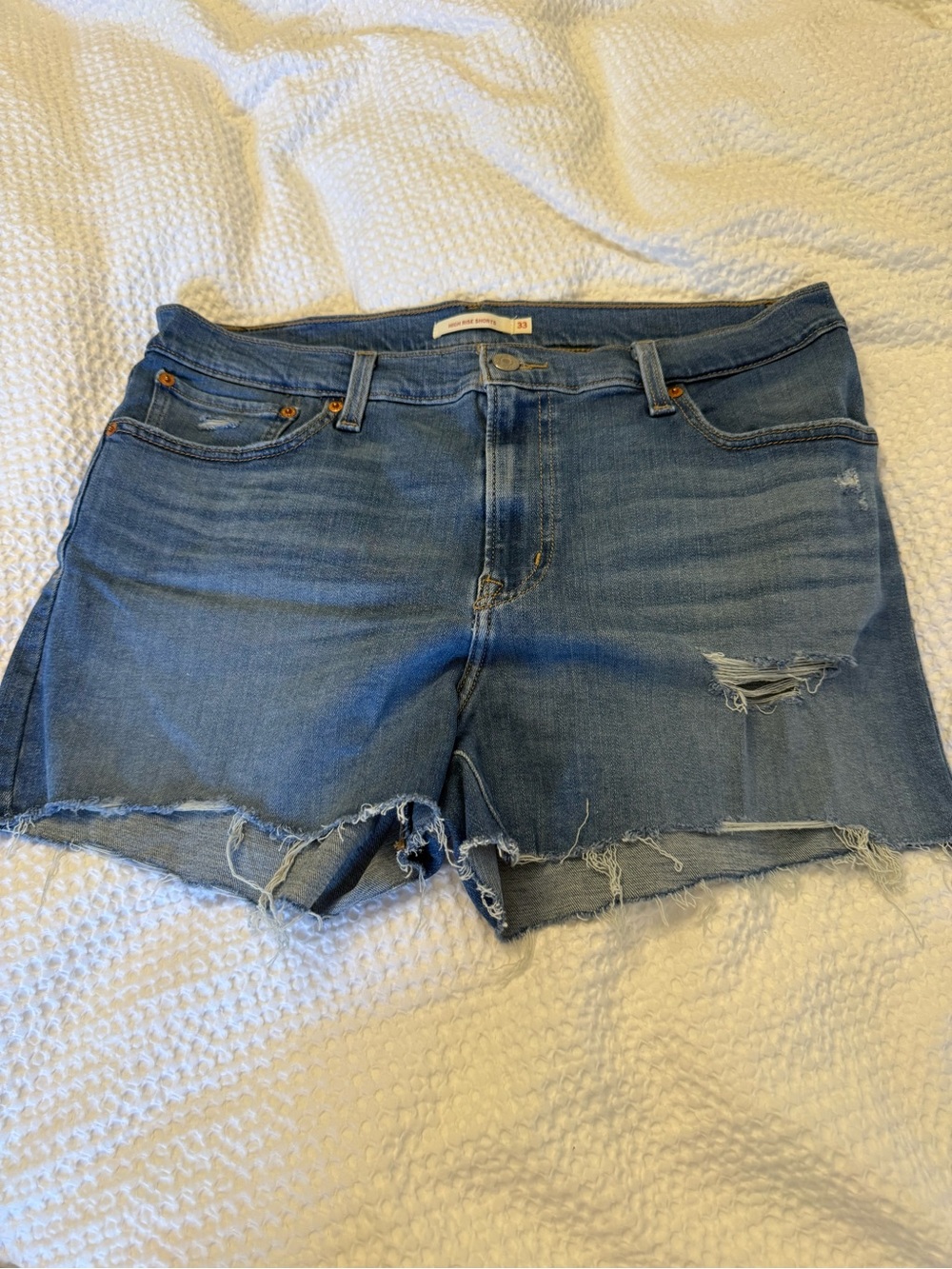 Levi's Distressed Cutoff Jean Shorts - Light Blue